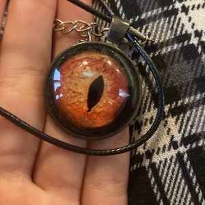 homemade orange eye necklace
